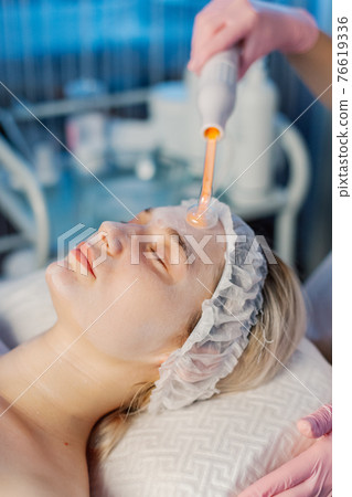 Darsonvalization of the face or rejuvenation of 76619336