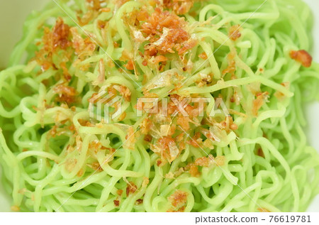 Chinese jade noodles dressing crispy fried chop garlic on bowl 76619781