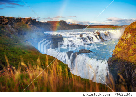 Gullfoss waterfall and the Olfusa river in southwest Iceland with a rainbow Gullfoss waterfall and the Olfusa river in southwest Iceland with a rainbow 76621343