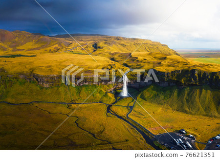 Aerial view of Seljalandsfoss Waterfall in Iceland at sunset Aerial view of Seljalandsfoss Waterfall in Iceland at sunset 76621351