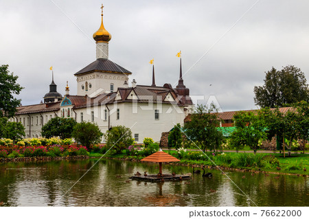 Church of St. Nicholas the Wonderworker and garden pond in Tolga convent in Yaroslavl, Russia Church of St. Nicholas the Wonderworker and garden pond in Tolga convent in Yaroslavl, Russia 76622000