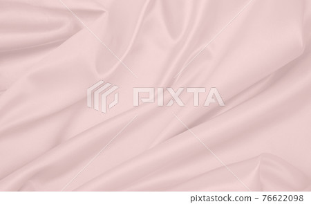 Smooth elegant pink silk or satin texture as wedding background. Luxurious background design Smooth elegant pink silk or satin texture as wedding background. Luxurious background design 76622098