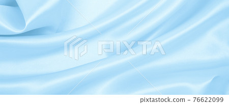 Smooth elegant blue silk or satin luxury cloth texture as abstract background. Luxurious background design 76622099