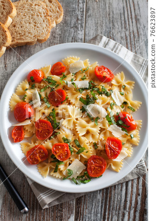 Pasta with fresh tomatoes and basil. High quality photo 76623897