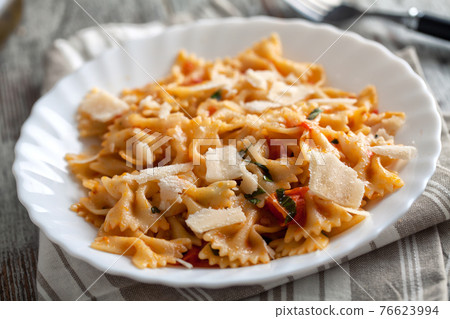 Pasta with fresh tomatoes and basil. High quality photo 76623994