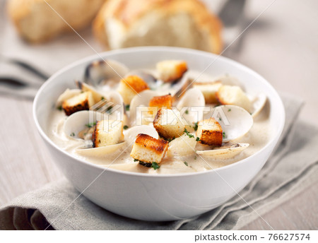 Creamy Clam Chowder on a plate. High quality photo. Creamy Clam Chowder on a plate. High quality photo. 76627574