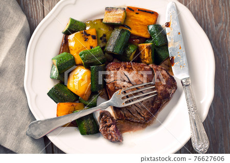 Fillet of beef with mixed vegetables. High quality photo. Fillet of beef with mixed vegetables. High quality photo. 76627606