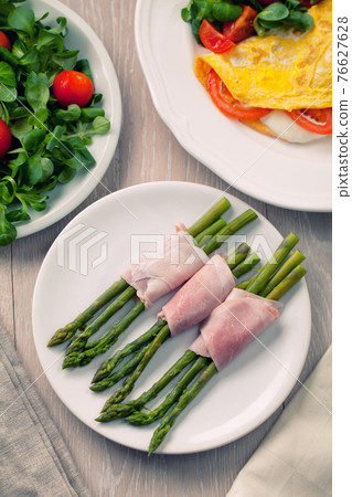 Ham rolls with asparagus. High quality photo. 76627628