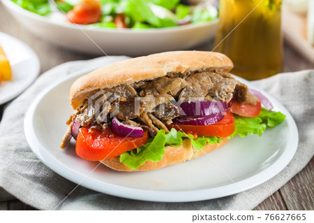 Greek Gyros Sandwich on a Plate. High quality photo. 76627665