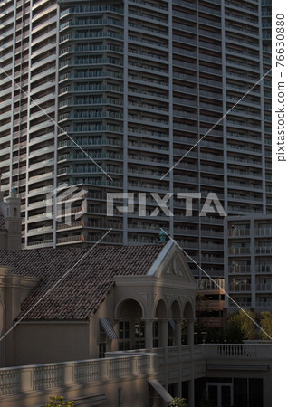 Classic church building buried in a valley of skyscrapers Classic church building buried in a valley of skyscrapers 76630880