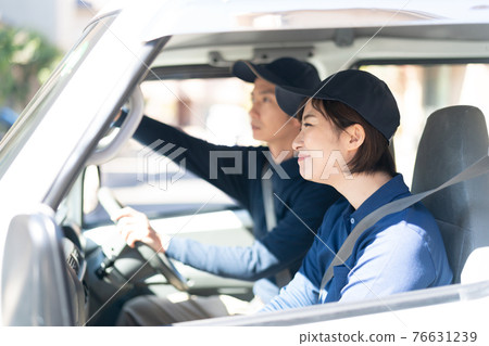 Staff driving a truck Staff driving a truck 76631239