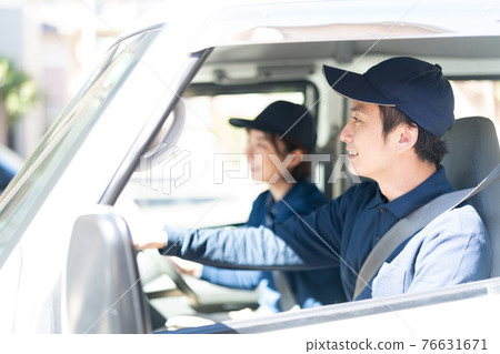 Staff driving a truck 76631671