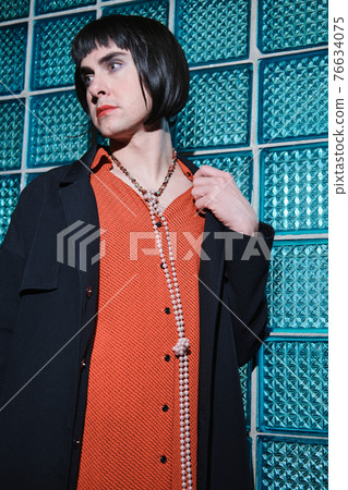 Transsexual posing in female dress 76634075