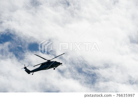 Sheriff Helicopter Hovering on a Beautiful Sky Background 76635997