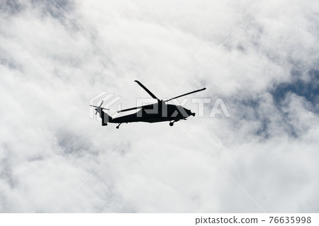 Sheriff Helicopter Hovering on a Beautiful Sky Background 76635998