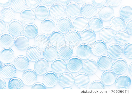 Lots of light blue marbles 76636674