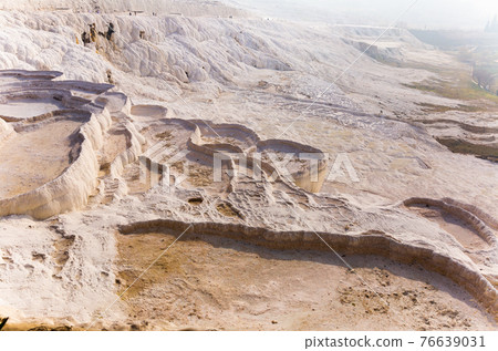 White travertine formations at hot springs of Pamukkale, Turkey White travertine formations at hot springs of Pamukkale, Turkey 76639031