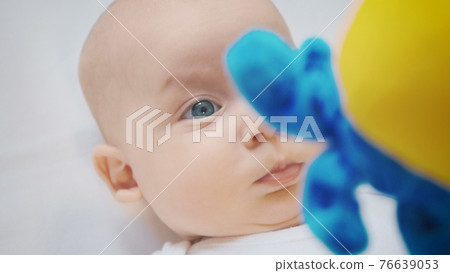 Photo of surprised baby four month girl 76639053