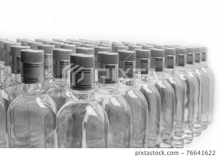 Bottles of pure alcohol not labeled.  76641622