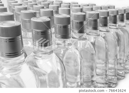Bottles of pure alcohol not labeled.  76641624