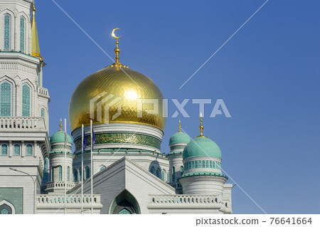 Islamic mosque on a blue sky background. The main cathedral mosque of Muslims in Moscow Russia. Islam, ramadan concept 76641664