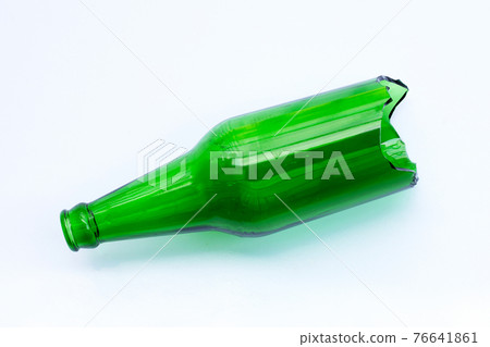 Broken green bottle on white background Broken green bottle on white background 76641861
