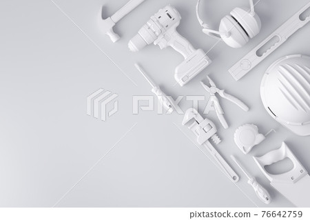 Top view of monochrome construction tools for repair and installation on white 76642759