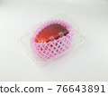Apple mango in a transparent pack 76643891