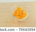 Apple mango served in a glass bowl 76643894