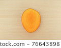 Apple mango before being cut 76643898