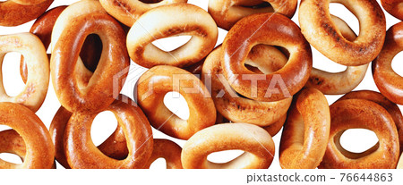 Tasty bagels isolated on white 76644863