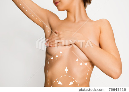 Close-up young attractive Caucasian woman isolated over white background. 76645316