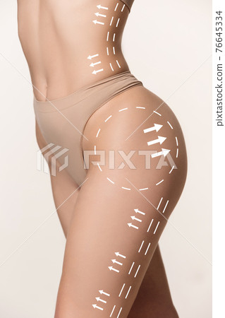 Beautiful slim female body in underwear isolated over white background. Beautiful slim female body in underwear isolated over white background. 76645334