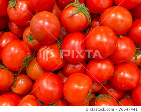 Macro photo of ripe tomatoes for backgrounds concept  76647441