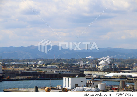 Factories along the coast under the blue sky Factories along the coast under the blue sky 76648453