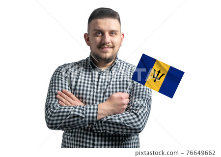 White guy holding a flag of Barbados smiling confident with crossed arms isolated on a white background 76649662