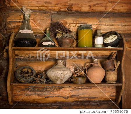 Wooden shelf with old scrap 76651076