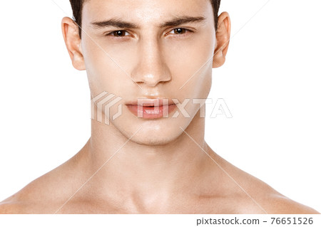 Strong muscle beautiful stripped male model in fashion cloathes on white isolated fontk background 76651526