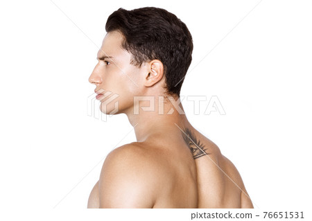 Strong muscle beautiful stripped male model in fashion cloathes on white isolated fontk background Strong muscle beautiful stripped male model in fashion cloathes on white isolated fontk background 76651531