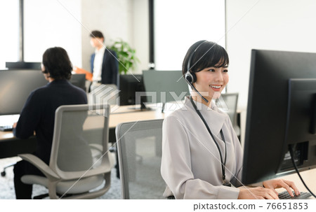 Business person working at a company 76651853