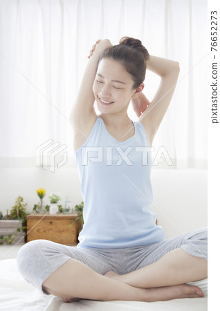 Women stretching Women stretching 76652273