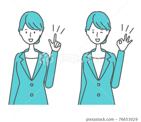 A woman in a suit pointing her finger and giving an OK sign 76653029