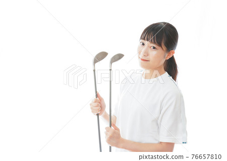 Young woman with a golf club 76657810