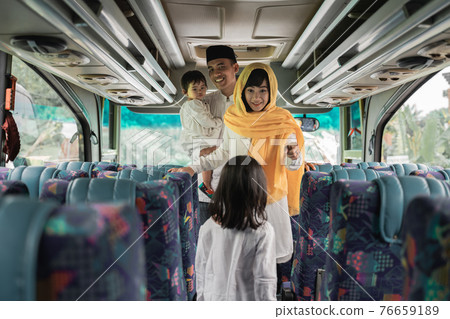 muslim holiday trip riding a bus together with family muslim holiday trip riding a bus together with family 76659189