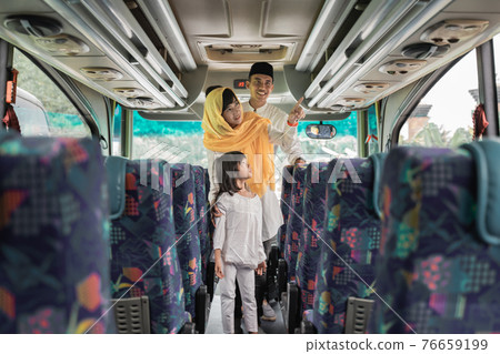 muslim holiday trip riding a bus together with family 76659199