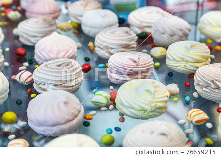 marshmallows with different flavors on the counter of a pastry shop marshmallows with different flavors on the counter of a pastry shop 76659215