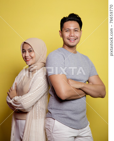 close up hijab women and men smiling crossed arms looking at camera close up hijab women and men smiling crossed arms looking at camera 76659770