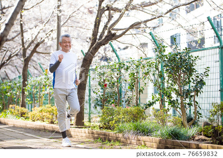 Active senior male walking running 76659832