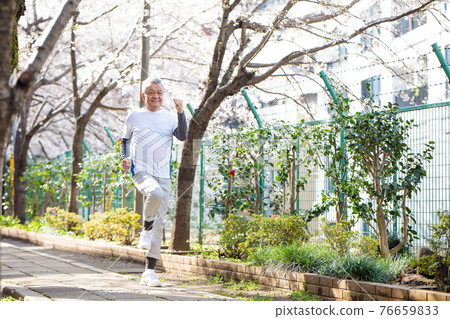 Active senior male walking running 76659833