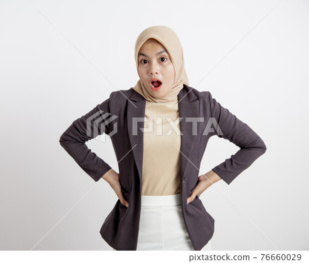 women wearing suits hijab surprised looking at the camera formal work concept 76660029